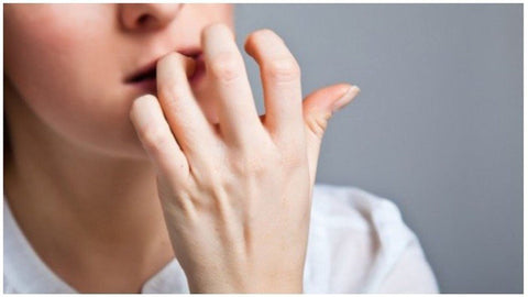 Why is nail biting a dangerous habit for your teeth?